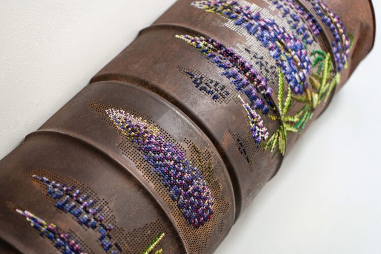 Flowers and Butterflies Sew Messages of Hope into Crumpled Steel and Corroded Barrels — Colossal