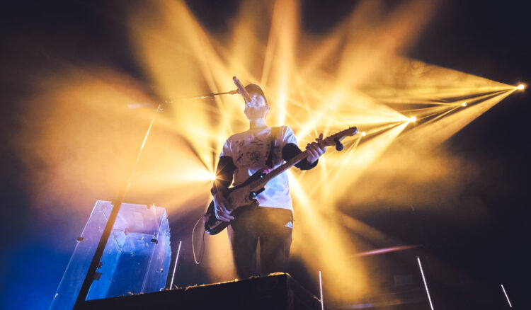 San Holo Seeks “Pure Human Ingredient” in New Stripped-Again Guitar Venture, san111