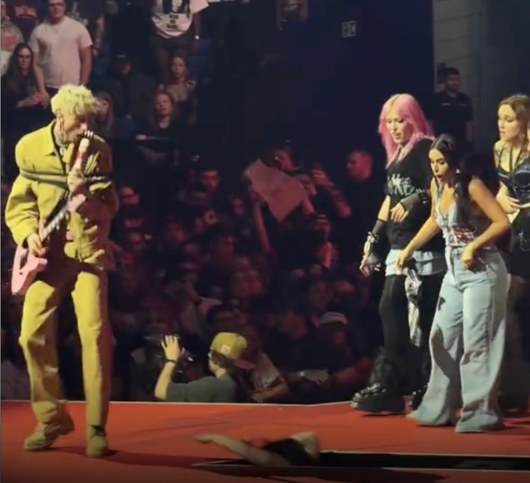 Machine Gun Kelly Fan Falls By Opening In Stage