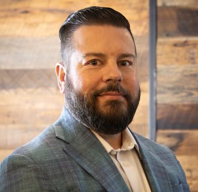 Egan promotes longtime chief to president