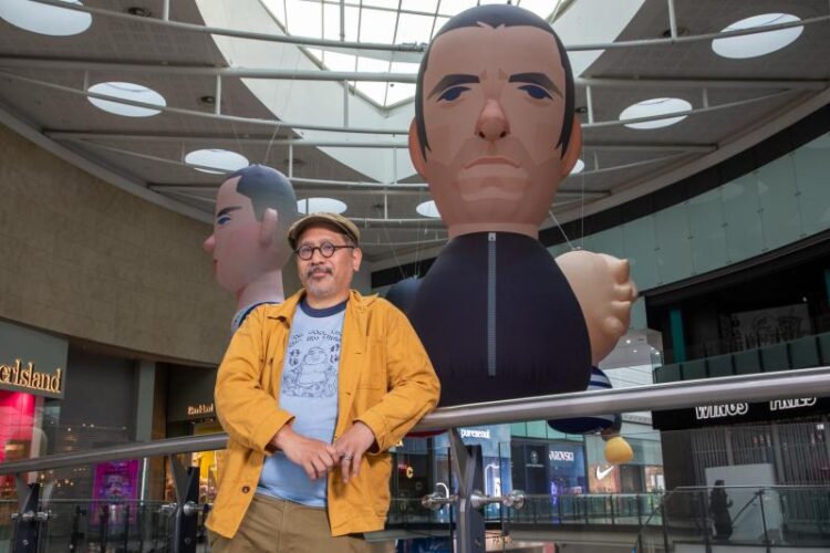 Stanley Chow fills the Arndale with 13 big inflatable Manchester icons for a free summer time path