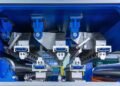 Multizone rigidity leveler engineered for hard-to-flatten alloys